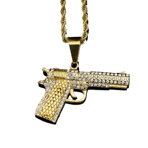 Hip hop gold plated pistol pendant with diamonds on a thick twisted rope chain necklace