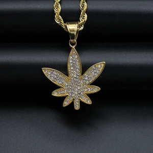 Hip hop gold plated stainless steel necklace featuring a crystal paved maple leaf pendant