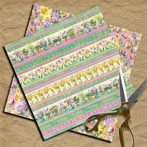 Detail of vintage spring floral scrapbook paper with tulip patterns and craft scissors