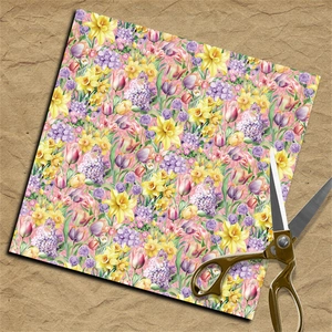 Detail of square vintage floral scrapbooking paper with retro scissors on kraft paper