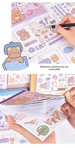 Detail of DIY cartoon bear sticker book showing paper thickness and cutting process