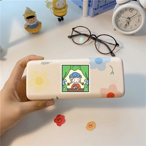 Floral glasses case featuring a cute girl illustration and beige spring-hinge cover