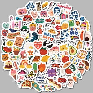 Pile of colorful cartoon graffiti stickers with food and animal motifs for DIY decoration