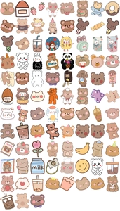 Flat lay of cute cartoon bear stickers for planners featuring milk tea and dessert patterns