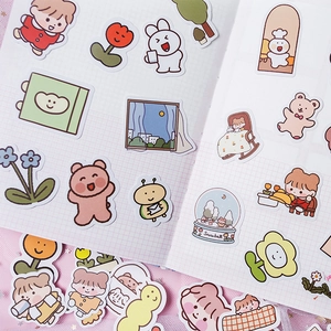 Cute Korean Fommy bunny and girl sticker set on a white grid notebook background