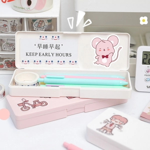 Pastel pink and white stationery organizer box with cute cartoon stickers and pens