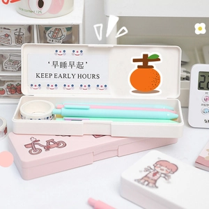Cute pink and cream stationery storage box with stickers and organized pen compartments