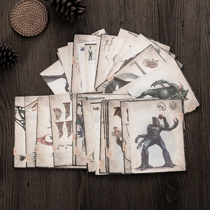 Macro view of retro Cthulhu monster illustrated cards stacked on a wooden background