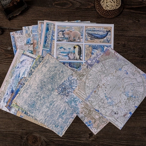 Vintage polar theme scrapbook paper set featuring blue Arctic motifs and map designs