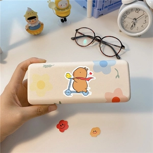 Matte rectangle eyeglass case with cute Capybara riding scooter and floral illustrations
