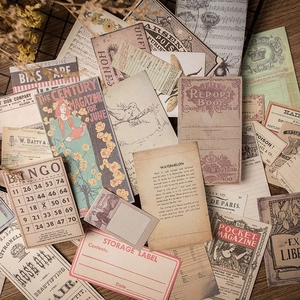 Vintage junk journal sticker collection with retro posters and ticket ephemera on wood