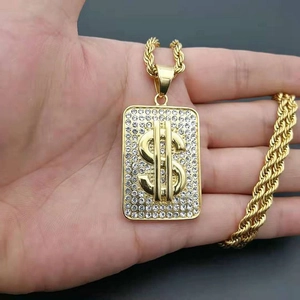 Hip hop gold plated dollar sign pendant necklace with crystals on a rope chain