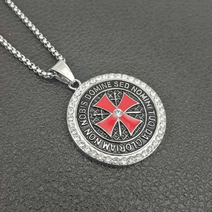 Close-up of Knights Templar pendant with red cross and Latin inscription on box chain
