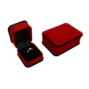 Red velvet jewelry box for rings with black lining, showing open and closed views