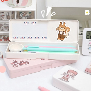 Detail of cute Korean squirrel stationery boxes in white and pink showing storage capacity