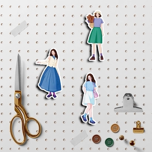 50 pieces of waterproof summer girl stickers for journals and laptops on a white board