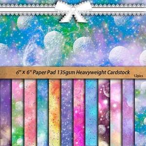 Starry sky themed scrapbook paper pad with 12 galactic nebula designs in 6x6 inch size