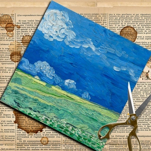 Vintage Van Gogh landscape art paper on newspaper background with golden scissors