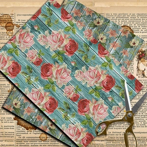 Vintage floral scrapbook paper with rose patterns and teal wood grain textures