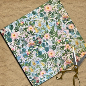 Floral scrapbooking paper with vintage forest plants and golden scissors on kraft background