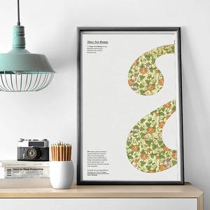 Framed vintage scrapbooking poster with pumpkin patterns in a minimalist home setup