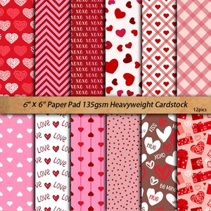 12 sheets of 6x6 inch Valentine's heart patterned scrapbook paper with Love and XOXO designs