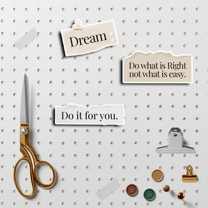 Detail of inspirational English phrase stickers with torn paper effect on a white pegboard
