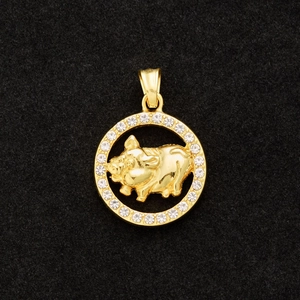Detailed view of a gold-plated round pig zodiac pendant with sparkling crystal accents