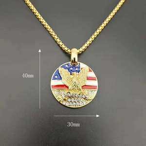 Detailed macro view of 40mm eagle pendant with American flag enamel and small diamonds