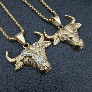 Hip-hop gold-plated bull head pendant necklace set with sparkling white rhinestones