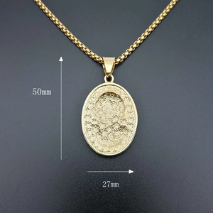 Iced out gold plated hip hop pendant with detailed relief and 50mm height measurement
