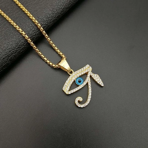 Gold plated titanium steel Eye of Horus necklace with blue stone and white crystals
