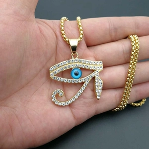 Gold plated Eye of Horus necklace with sparkling crystals and a blue eye pendant
