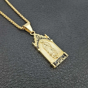 18K gold plated stainless steel Virgin Mary pendant necklace on leather background