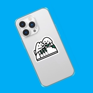 Detailed view of transparent phone case with cute white cartoon dog illustration on blue