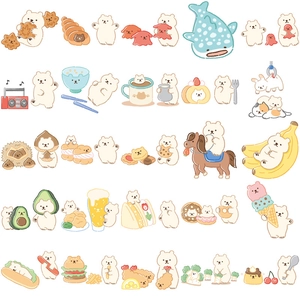 Flat lay of cute cartoon white bear stickers with various food and life scene motifs