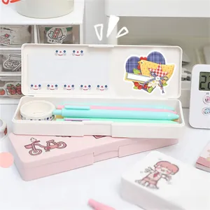Close-up of organized stationery box with cute animal stickers and colorful pens