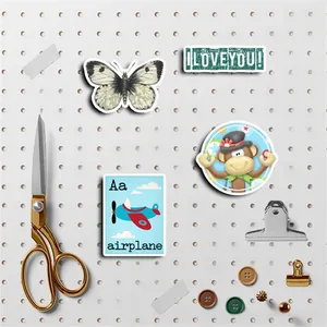 Artistic stationery scene with blue butterfly stickers and cute animal themed decals