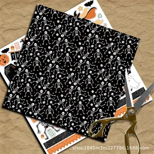 Halloween vintage scrapbooking paper with skull and pumpkin patterns and retro scissors