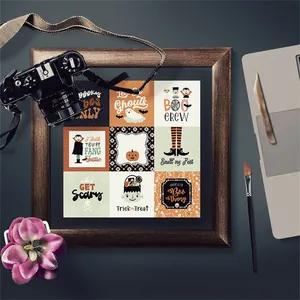 Detail of vintage Halloween scrapbook paper featuring spooky ghosts and classic pumpkins