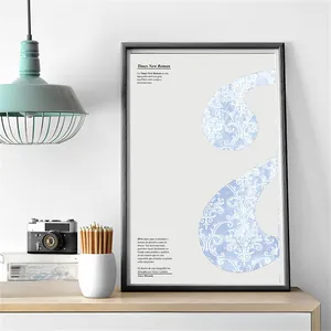 Detail of vintage art print with blue ornate comma typography and retro room decor