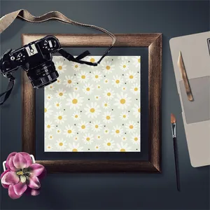 Close-up of vintage daisy scrapbooking paper in a rustic frame with antique props