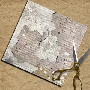 Close-up of vintage scrapbook paper with damask pattern and musical notes with golden scissors