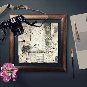 Close-up of vintage Bauhaus collage paper featuring ballet and opera motifs in a frame