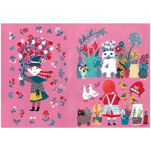 Detailed view of vintage animal illustrations and floral art paper for scrapbooking