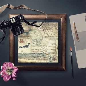 Macro shot of vintage nautical collage paper with sailing ship, whale and crab patterns