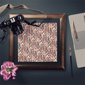 Retro dress form and rose scrapbooking paper displayed in a vintage wooden frame