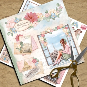 Macro view of French vintage journal paper with floral and Eiffel Tower collage designs