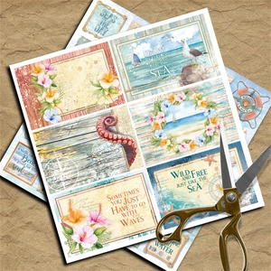 Detail of vintage nautical scrapbooking paper with sea life patterns and bronze scissors