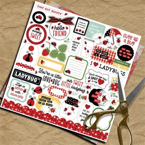 Macro detail of vintage ladybug scrapbooking paper with retro scissors on leather
